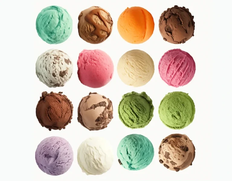 Sixteen assorted scoops of colorful ice cream in a 4x4 grid, showcasing a variety of vibrant flavors like chocolate, vanilla, strawberry, mint, mango, and more on a white background.
